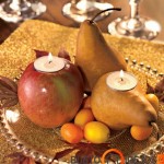 Populiariausių vaisių kompozicija su žvakėmis